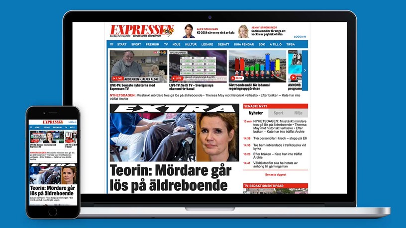 Bild på MacBook med Iphone som har en expressen tidningssida uppe